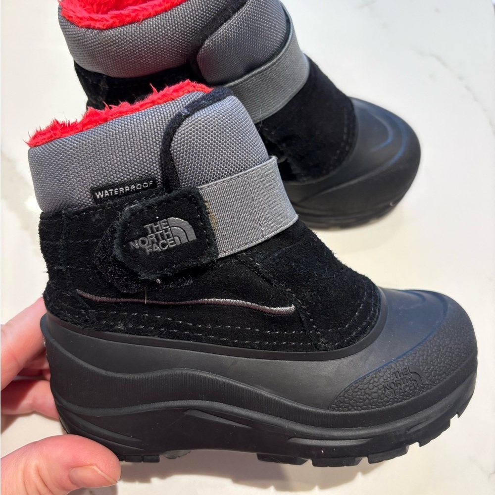 New. The North Face Kids Black and Gray Waterproof Winter Boots with Red Lining